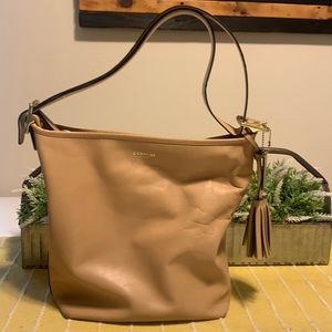 Tan coach bucket bag